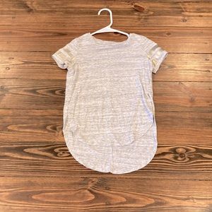 Gray shirts with Gold bands on shoulders